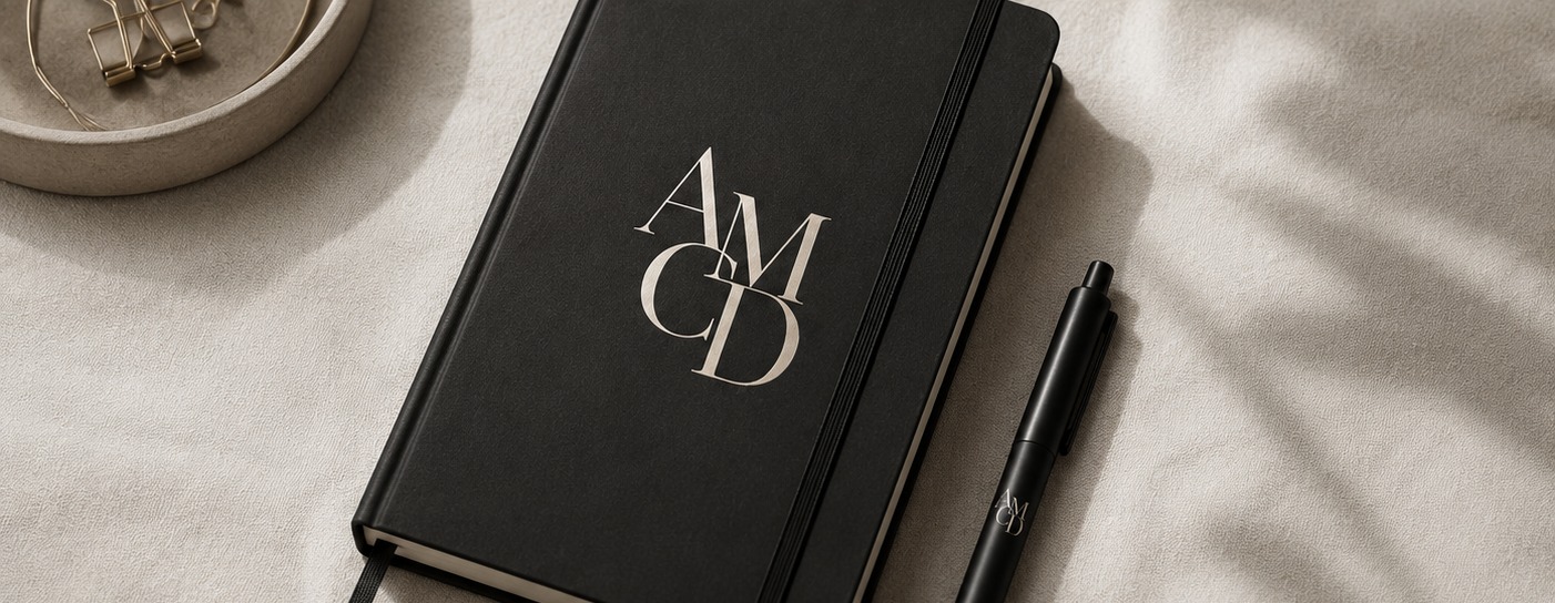 AMCD notebook with gold monogram